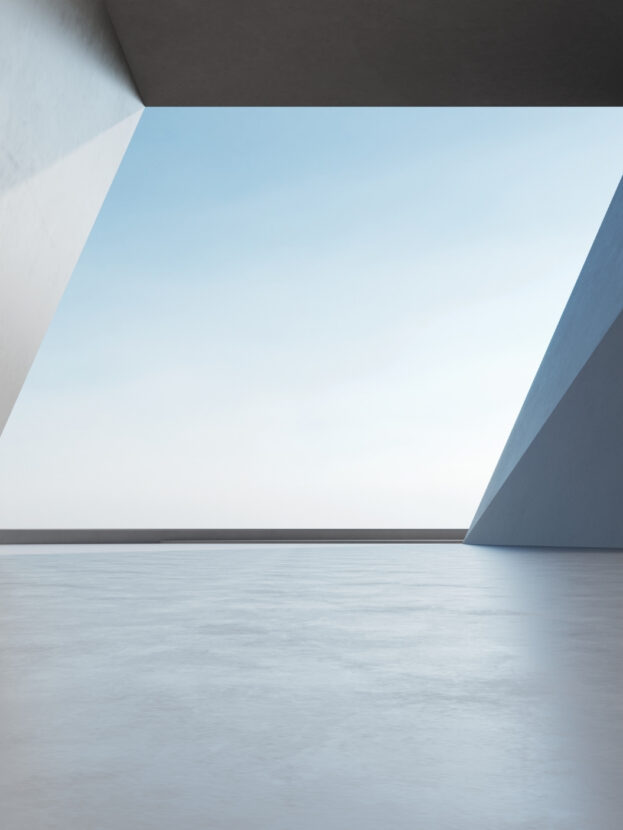 Estrutura geométrica moderna com abertura, céu azul visível ao fundo. Design minimalista e linhas elegantes.